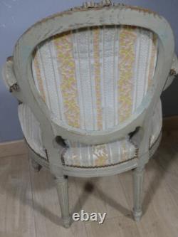 Fauteuil de style Louis XVI en bois sculpté et laqué, époque XIX ème siècle