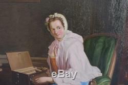 Femme à la serinette huile sur toile époque début XIXème