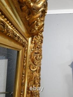 Grand cadre Napoléon III en bois et stuc doré, époque XIX ème