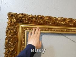 Grand cadre Napoléon III en bois et stuc doré, époque XIX ème