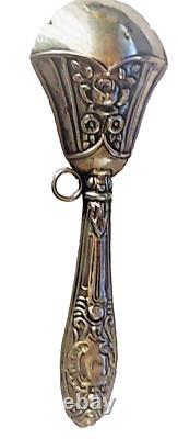 Hochet ancien en argent décor rose époque fin XIXème siècle