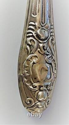 Hochet ancien en argent décor rose époque fin XIXème siècle