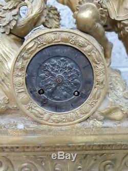 Horloge Ancienne en bronze doré, époque Empire Restauration XIX ème s