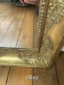 Magnifique miroir époque Empire en bois doré XIX Eme