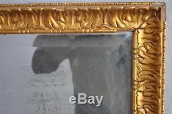 Miroir ancien en bois et stuc doré d'époque fin XIXème