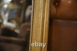 Miroir au mercure époque Louis Philippe doré à la feuille XIXème