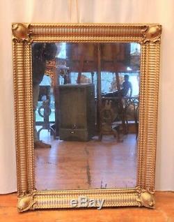 Miroir doré rectangulaire en bois et stuc époque XIX ème siècle