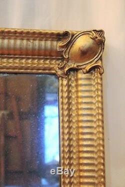 Miroir doré rectangulaire en bois et stuc époque XIX ème siècle
