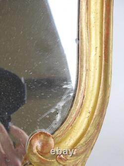 Miroir époque XIXème siècle, cadre en bois sculpté doré, Style Louis XV
