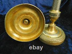 Paire de bougeoirs en bronze doré ciselés d'époque Empire XIXème