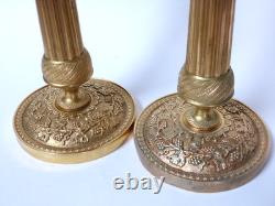 Paire de chandeliers en bronze doré ciselé époque restauration début XIXeme