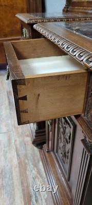 Paire de chevets style Renaissance en noyer sculpté époque XIXeme siécle