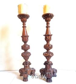 Paire de grands bougeoirs /piques cierges en bois sculpté, époque XIXème. 45 cm