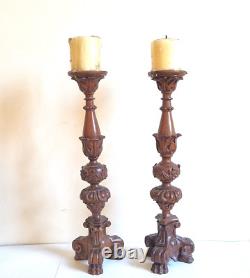 Paire de grands bougeoirs /piques cierges en bois sculpté, époque XIXème. 45 cm