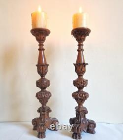 Paire de grands bougeoirs /piques cierges en bois sculpté, époque XIXème. 45 cm
