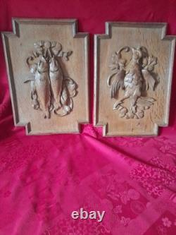 Paire de portes anciennes en bois sculpté trophée de chasse et péche époque 19e