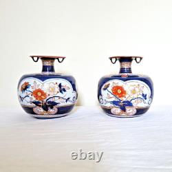 Paire de très beaux vases en porcelaine signés Tinet à Paris, époque XIXème s