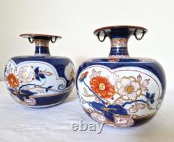 Paire de très beaux vases en porcelaine signés Tinet à Paris, époque XIXème s