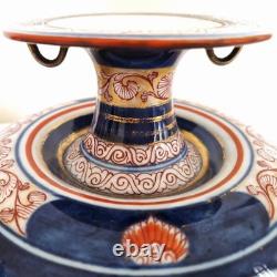 Paire de très beaux vases en porcelaine signés Tinet à Paris, époque XIXème s