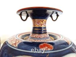 Paire de très beaux vases en porcelaine signés Tinet à Paris, époque XIXème s
