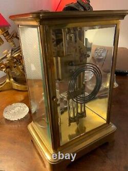 Pendule cage bronze et verre époque XIXeme