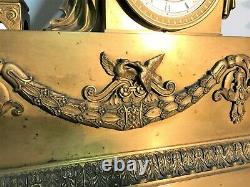 Pendule en bronze doré époque Empire XIXème siècle