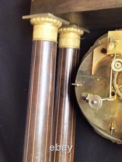 Pendule portique en bois clair et bronze doré / Epoque Restauration / XIXe