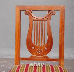 Série huit chaises Restauration à la lyre époque XIXème