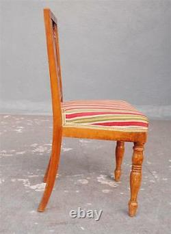 Série huit chaises Restauration à la lyre époque XIXème