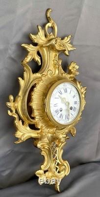 Très beau Cartel d'applique mural style Louis XV en bronze doré époque 19ème