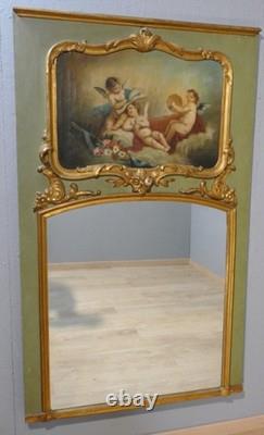Trumeau aux anges de style Louis XV en bois laqué et doré, époque fin XIX ème