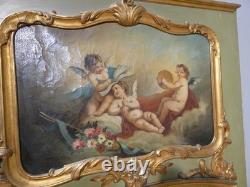 Trumeau aux anges de style Louis XV en bois laqué et doré, époque fin XIX ème