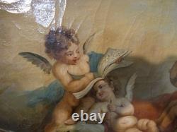 Trumeau aux anges de style Louis XV en bois laqué et doré, époque fin XIX ème