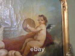 Trumeau aux anges de style Louis XV en bois laqué et doré, époque fin XIX ème