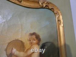 Trumeau aux anges de style Louis XV en bois laqué et doré, époque fin XIX ème