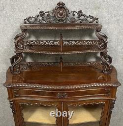 Vitrine galbée d'époque Napoléon III, réalisée en acajou, datant du XIX eme